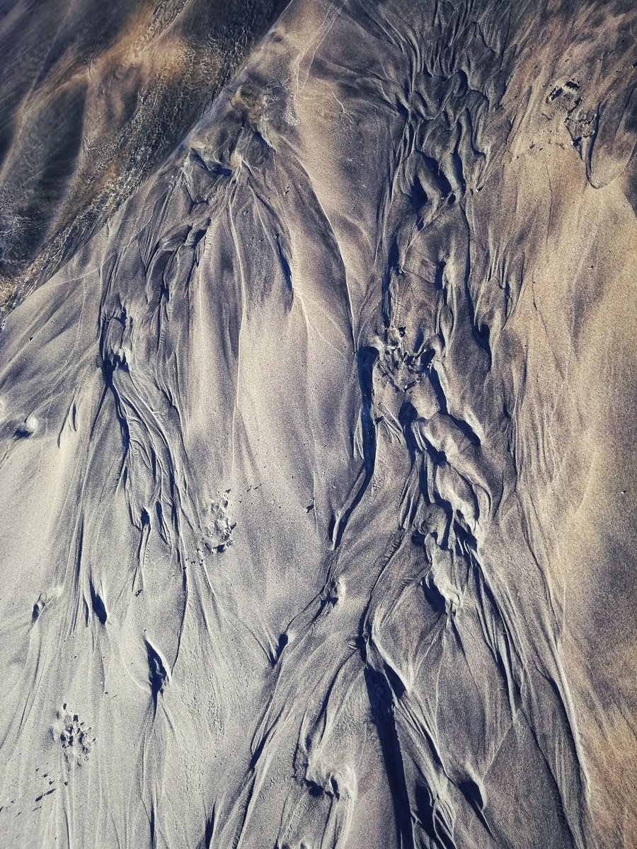 caradraw's tweet image. Messing about with old photos.Dramatic sand patterns looking a bit sinister here. Weather today in Cornwall is so dark wet and depressing. #weather #sandpattern #photography