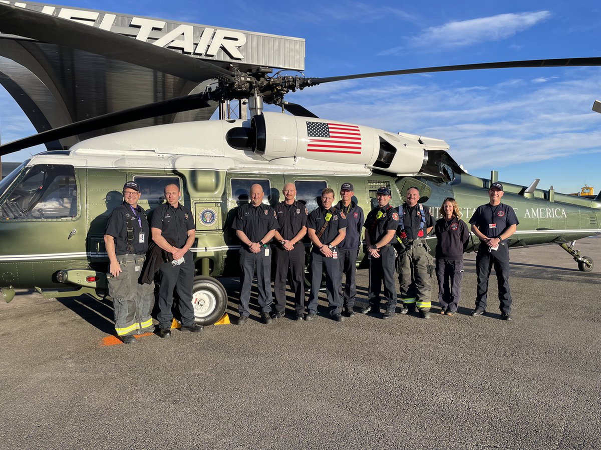 North Metro firefighters pose in front of Marine One