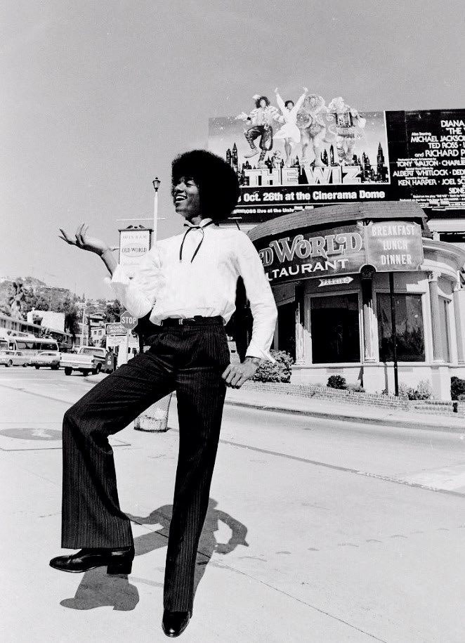 Michael in front of a Billboard for “The Wiz”, 1978.✨🖤