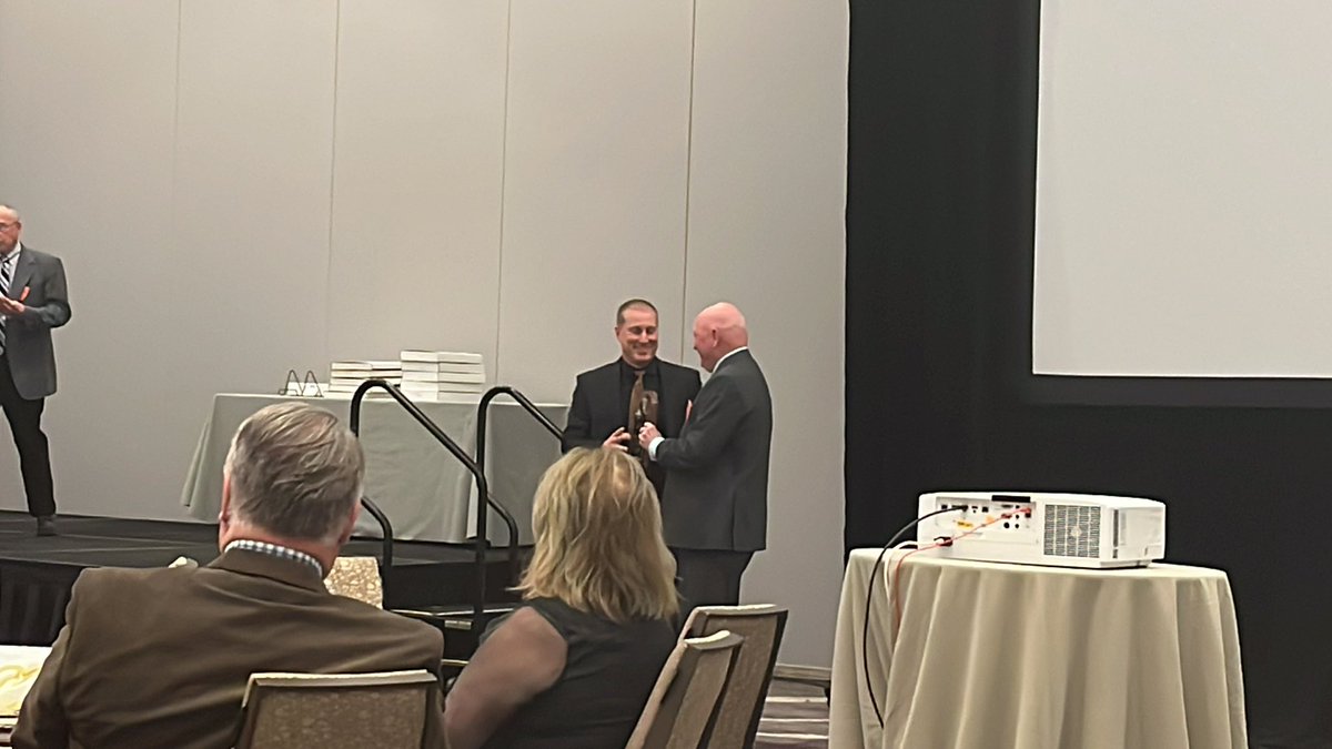 Joe Erb accepts his HOF Induction Plaque at #ITCCCAClinic22