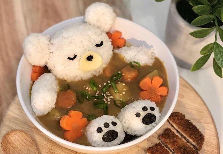 Oh to be a rice bear sleeping in a bowl of curry.