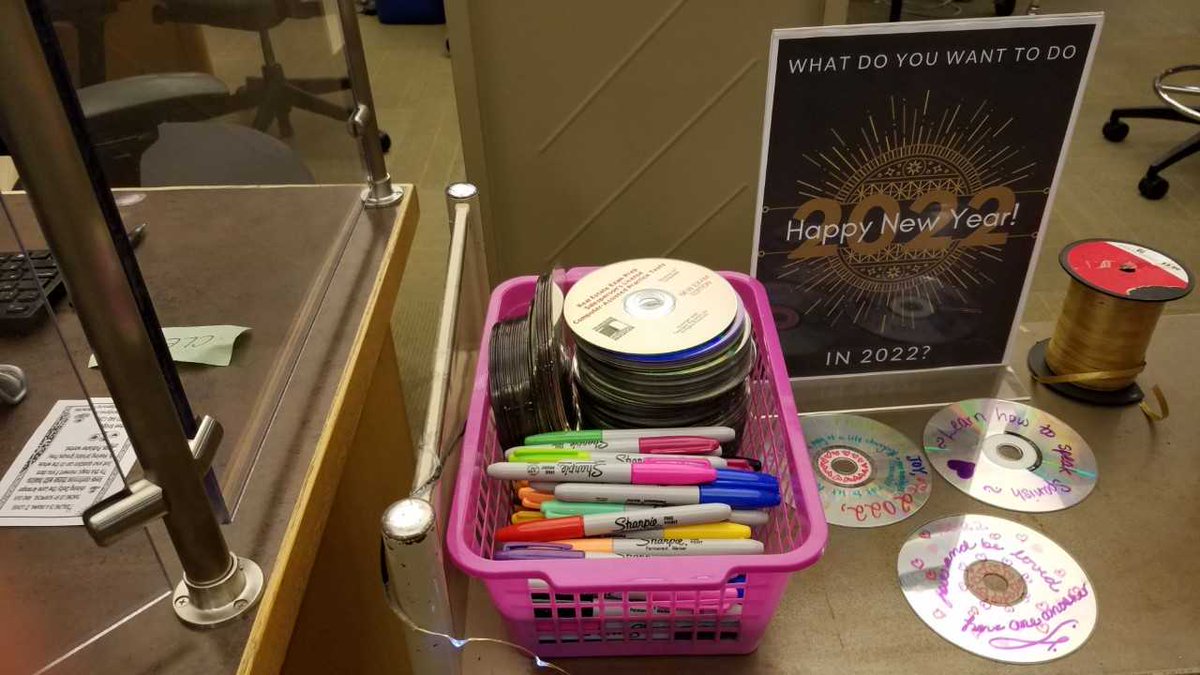 Library95472's tweet photo. At our #SebastopolLibrary service desk you can write what you wish for this New Year 2022 in colored pens on CD disks and we will hang them up. https://t.co/Y3oh6oIbsE