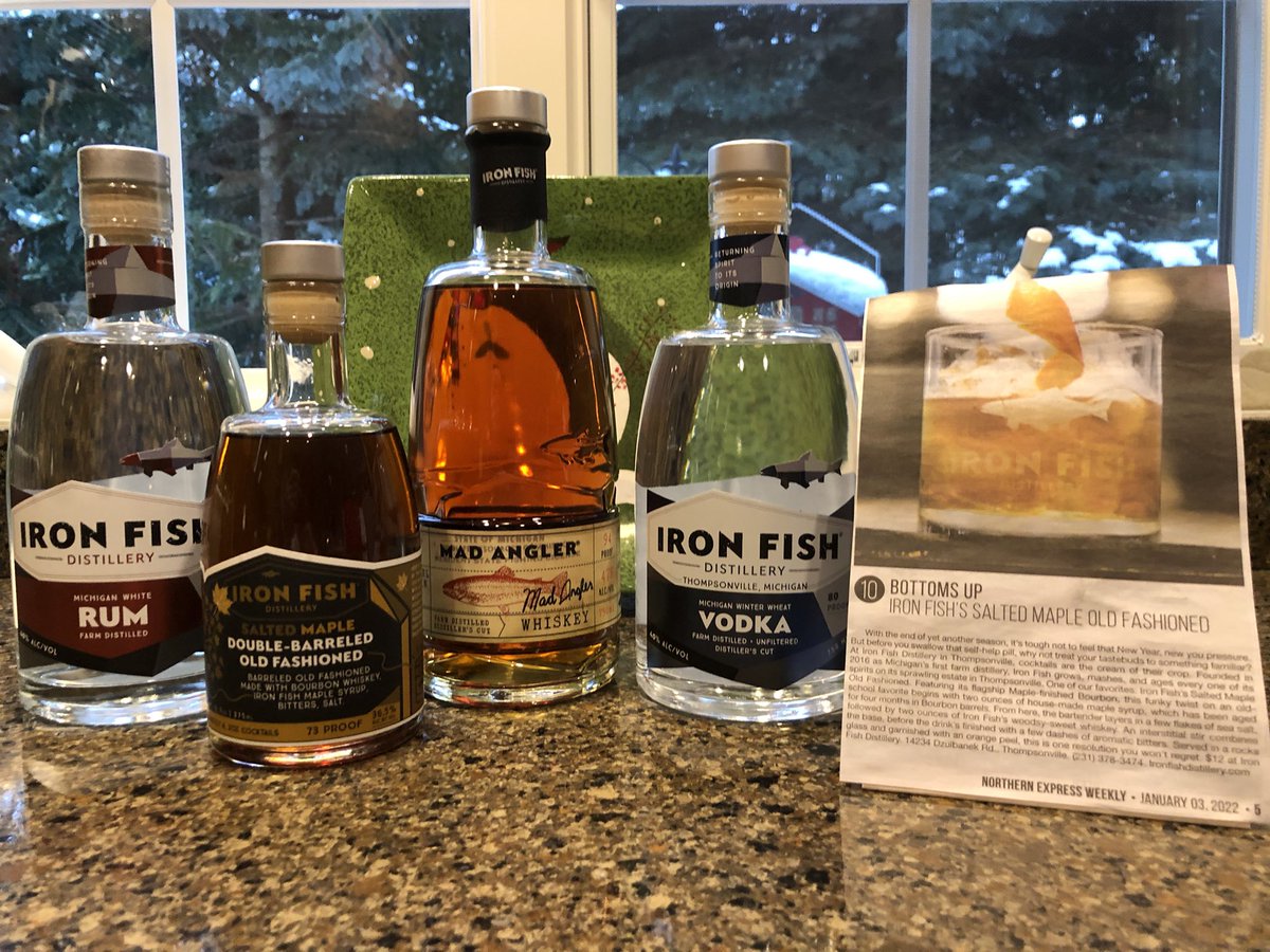 chachaspillane's tweet photo. @IronFishDistil Well looky what just arrived at my home in Elk Rapids, a brilliant mix of your delightful rum, whiskey, vodka, salted maple old fashioned, fondly known as #SMOF and a custom made, waxed @StormyKromer @PureMichigan at its finest #FamilyFarm https://t.co/RVriIo9Ogj