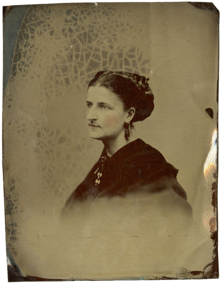 A photograph of a young Kate Furbish, with a bit of red tinting on her cheek.