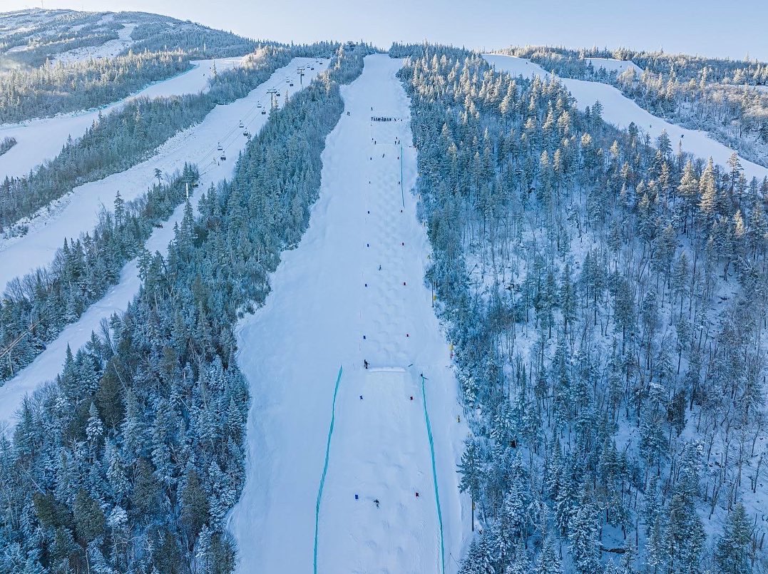 GoCVA's tweet photo. Happening this weekend! The first USSA Eastern Championship Series (ECS), "A" level Freestyle Competition event of the year, the Kagan Cup, right here @sugarloafmountain.

A huge thank you goes out to @mainedroneimaging for these awesome shots! #gocva #godogsgo #freestyle #moguls https://t.co/ZTJmK7HH3E