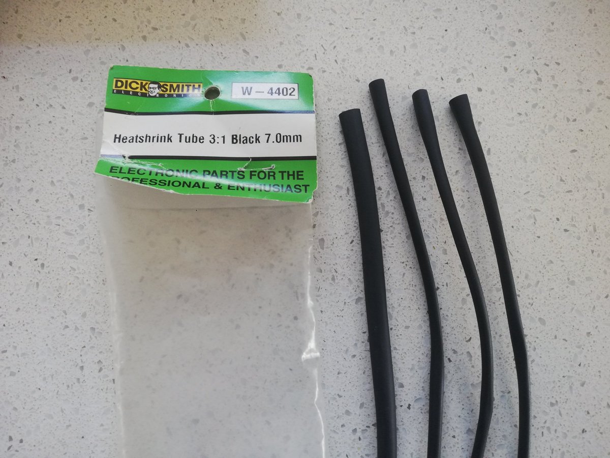 Protip #355 When you're repairing a spa heater for your parents (by replacing a corroded thermal switch that's gone open) don't leave your baggy of heatshrink on top of the spa cover that's been baking in the sun.