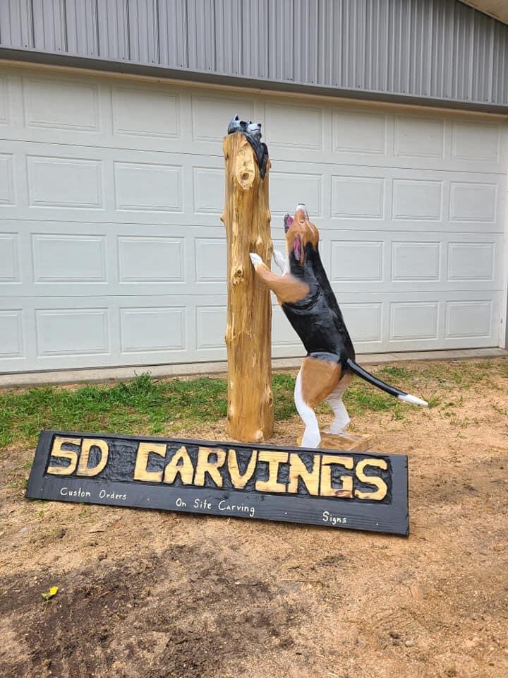 beesbirdstrees's tweet photo. Carvings are done by a local young man with his chainsaw. So unique, isn’t he talented? #5DCarvings #chainsawcarving #coonhunter https://t.co/mAw1XKrKh6