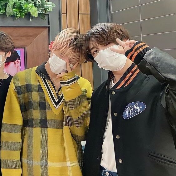 head bonks and ✌️ 

their hair matches in a way and the peace sign><