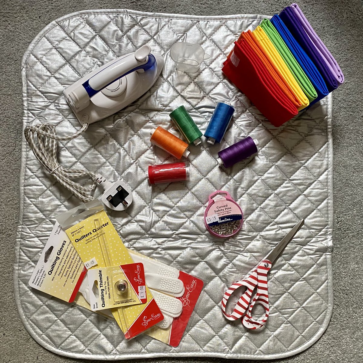 bettercareliz's tweet photo. Look at my gorgeous raffle prize from B&amp;M fabrics in @LeedsMarkets! Teeny iron, pressing mat, scissors and quilting supplies. #StitchingFun https://t.co/N57odIJGyu