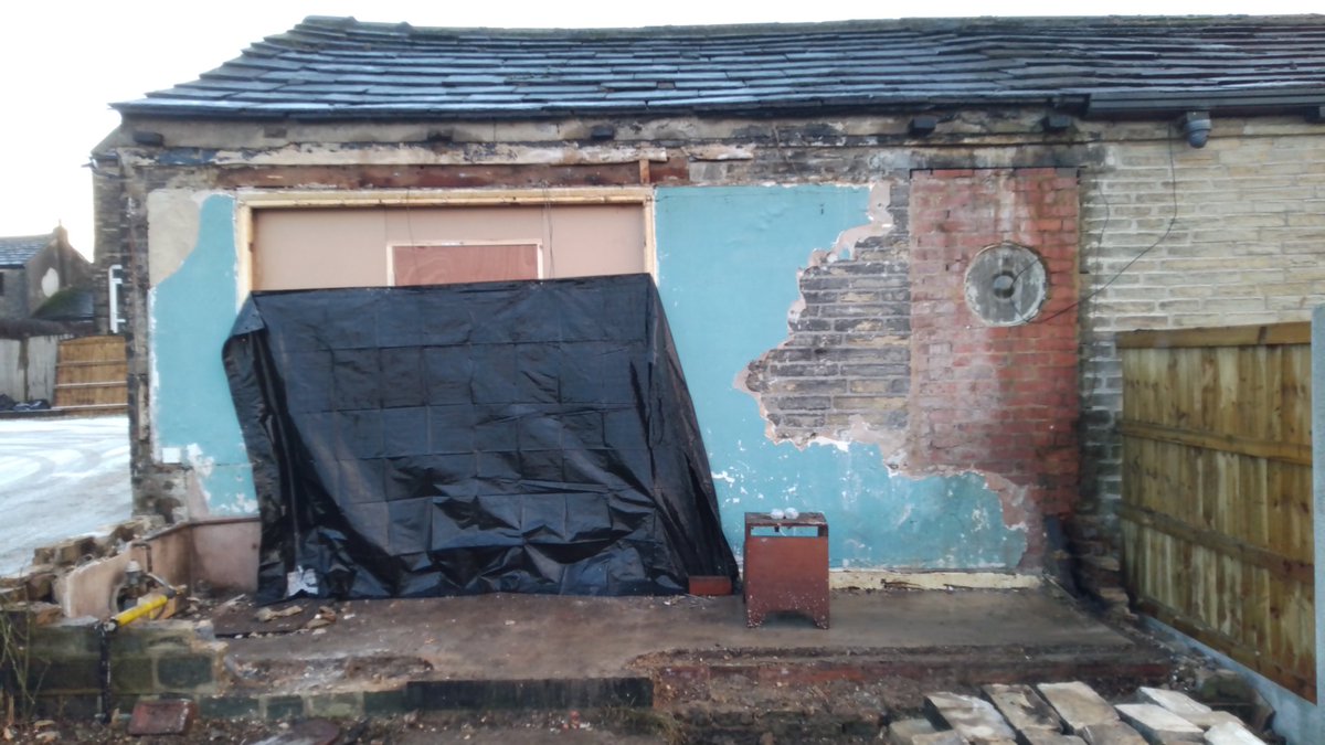 Demolition of an old conservatory this week.