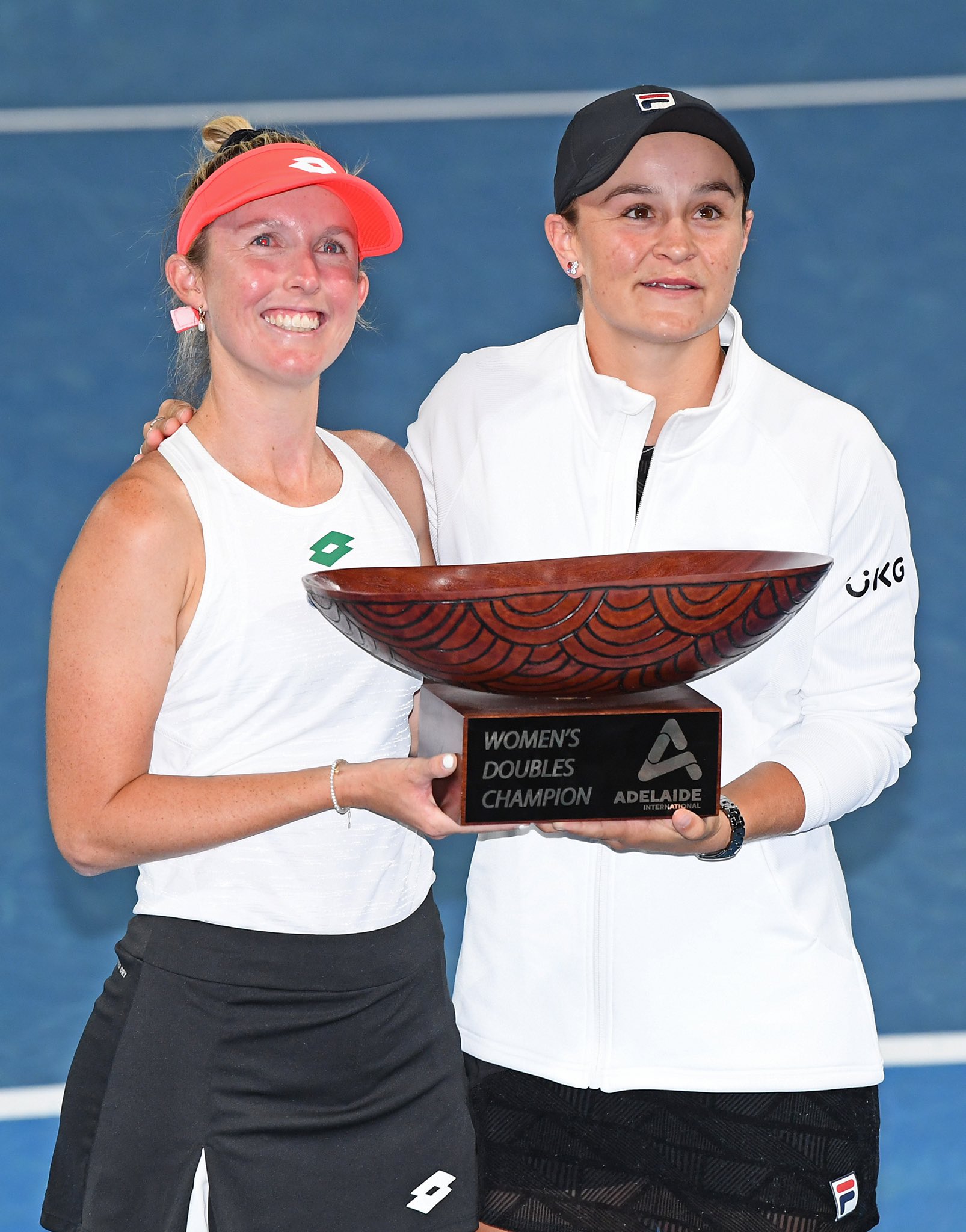Storm Sanders and Ashleigh Barty of Australia  with the Womens Doubles Champion Trophy after defeating Darija Jurak Schreiber of Croatia and Andreja Klepac of Slovenia during day eight of the 2022 Adelaide International at Memorial Drive on January 09, 2022 in Adelaide, Australia.