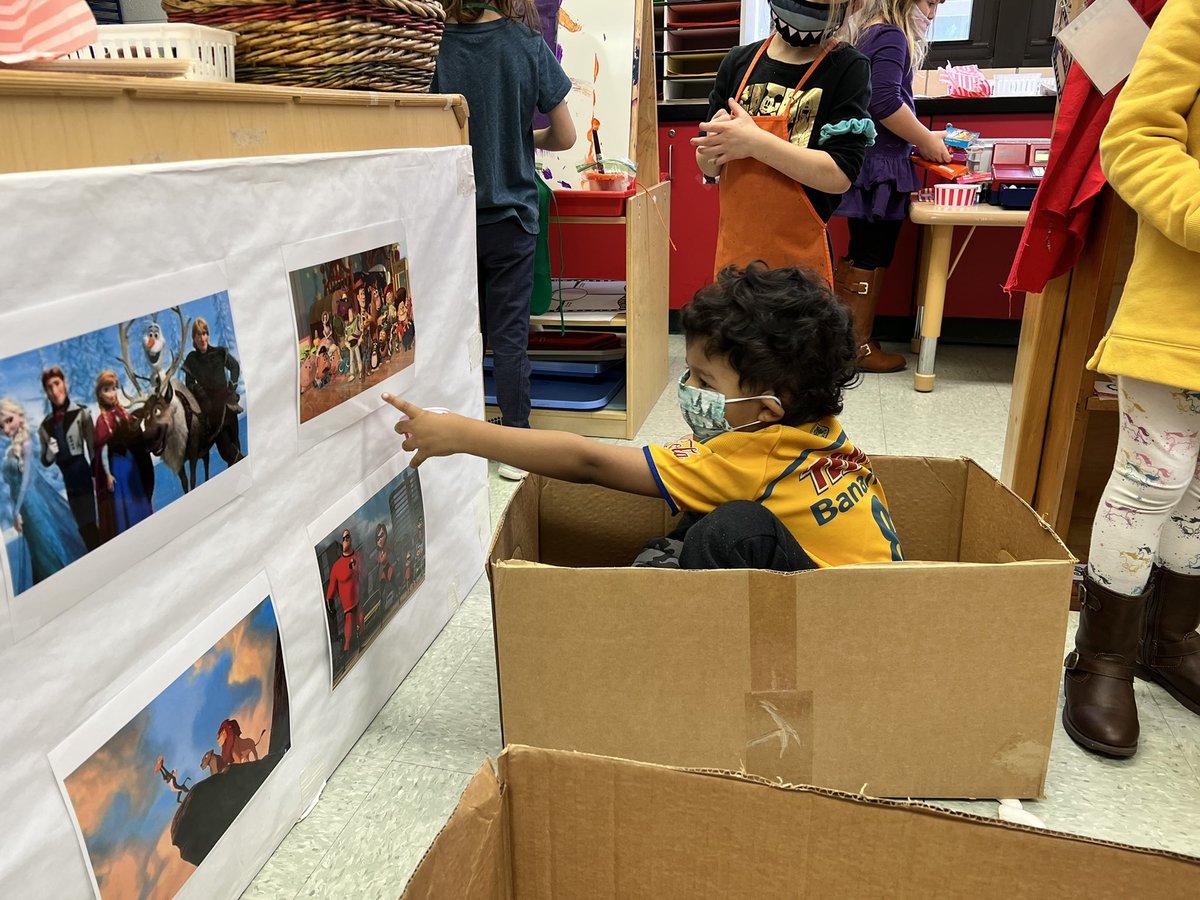 CoryMehnert's tweet photo. One of our amazing EC teachers set up a movie theater in dramatic play to kick off our box study. Problem solving, reciprocal conversation, turn-taking, counting w/1:1 correspondence, number identification, sequencing and writing, all during play. #playtolearn #ECE @B_Kueker https://t.co/L64UNWWSAa