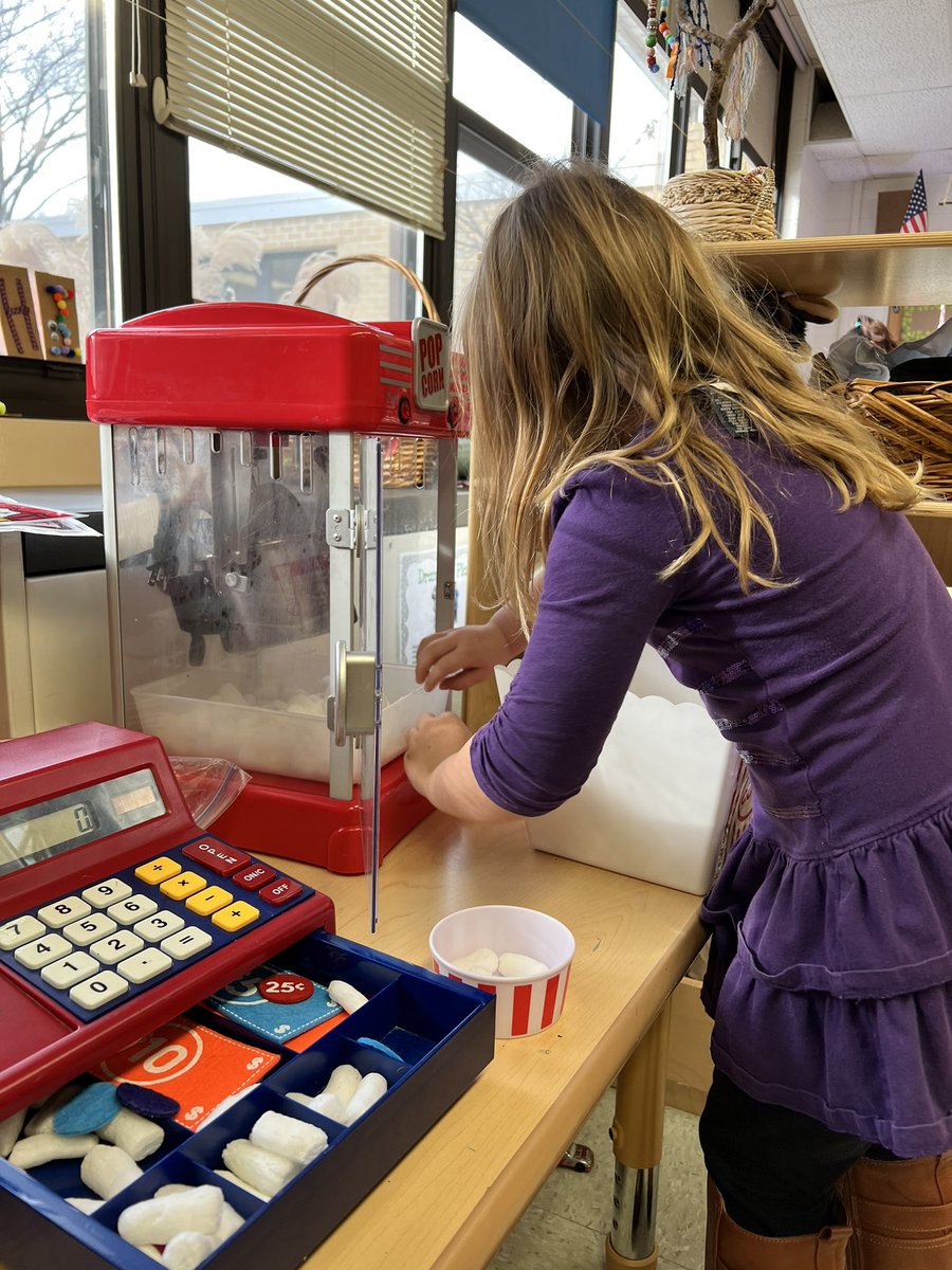 CoryMehnert's tweet photo. One of our amazing EC teachers set up a movie theater in dramatic play to kick off our box study. Problem solving, reciprocal conversation, turn-taking, counting w/1:1 correspondence, number identification, sequencing and writing, all during play. #playtolearn #ECE @B_Kueker https://t.co/L64UNWWSAa