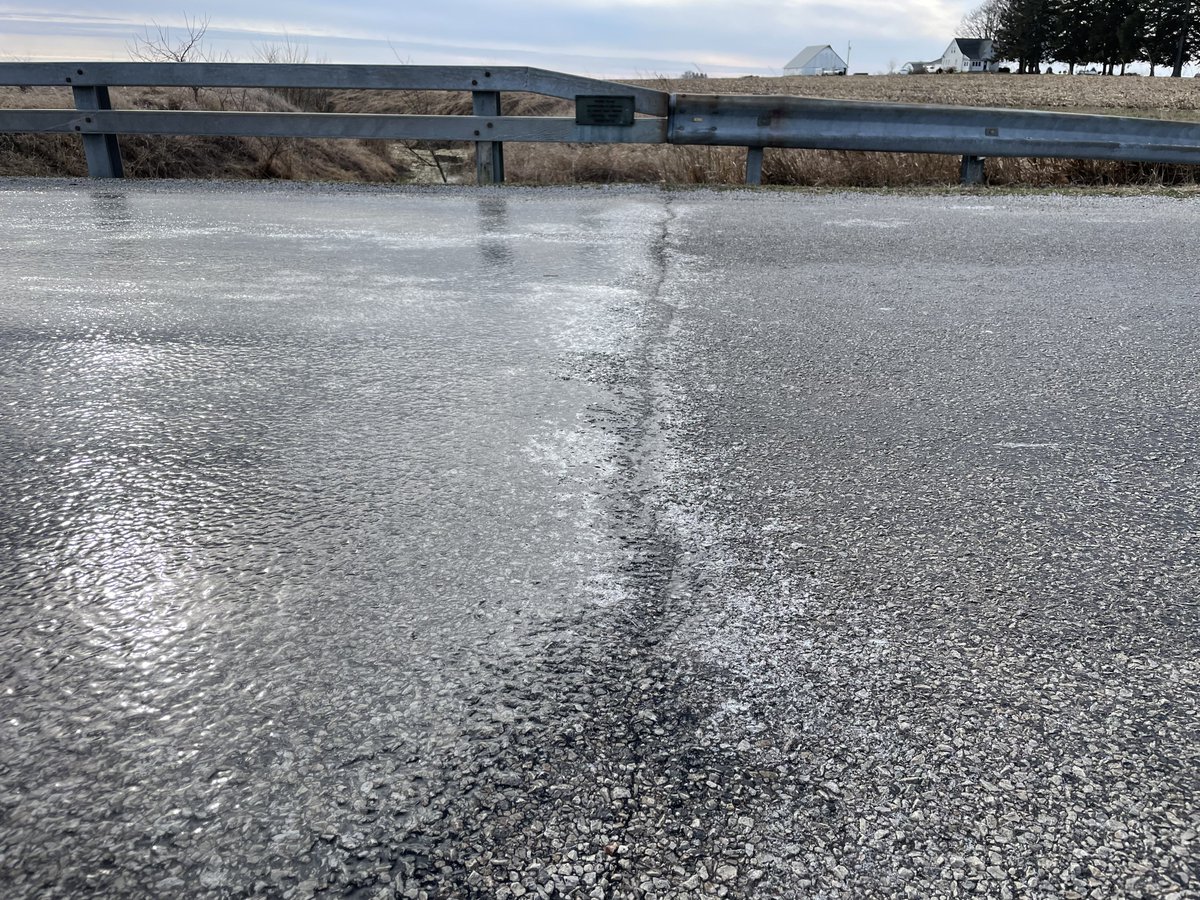 Clear as day example of a bridge icing over before it’s surroundings.

Most roads across Champaign County are passable, but isolated slick spots remain as temperatures plummet today. #ilwx