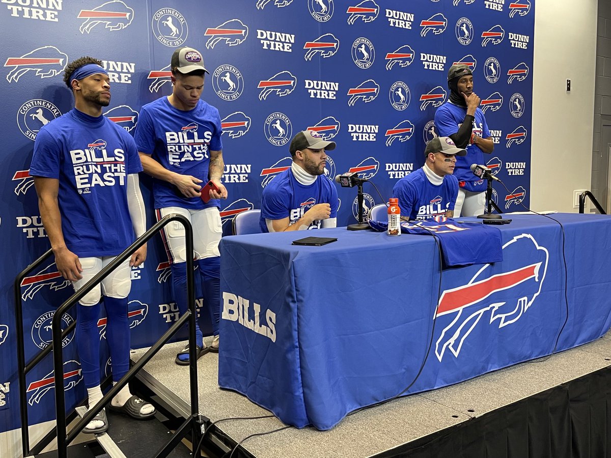 JoeBuscaglia's tweet photo. All five members of the Bills secondary are here for the postgame press conference, and their first move was to drape Tre’Davious White’s jersey over the table. https://t.co/MSzq5kBh04