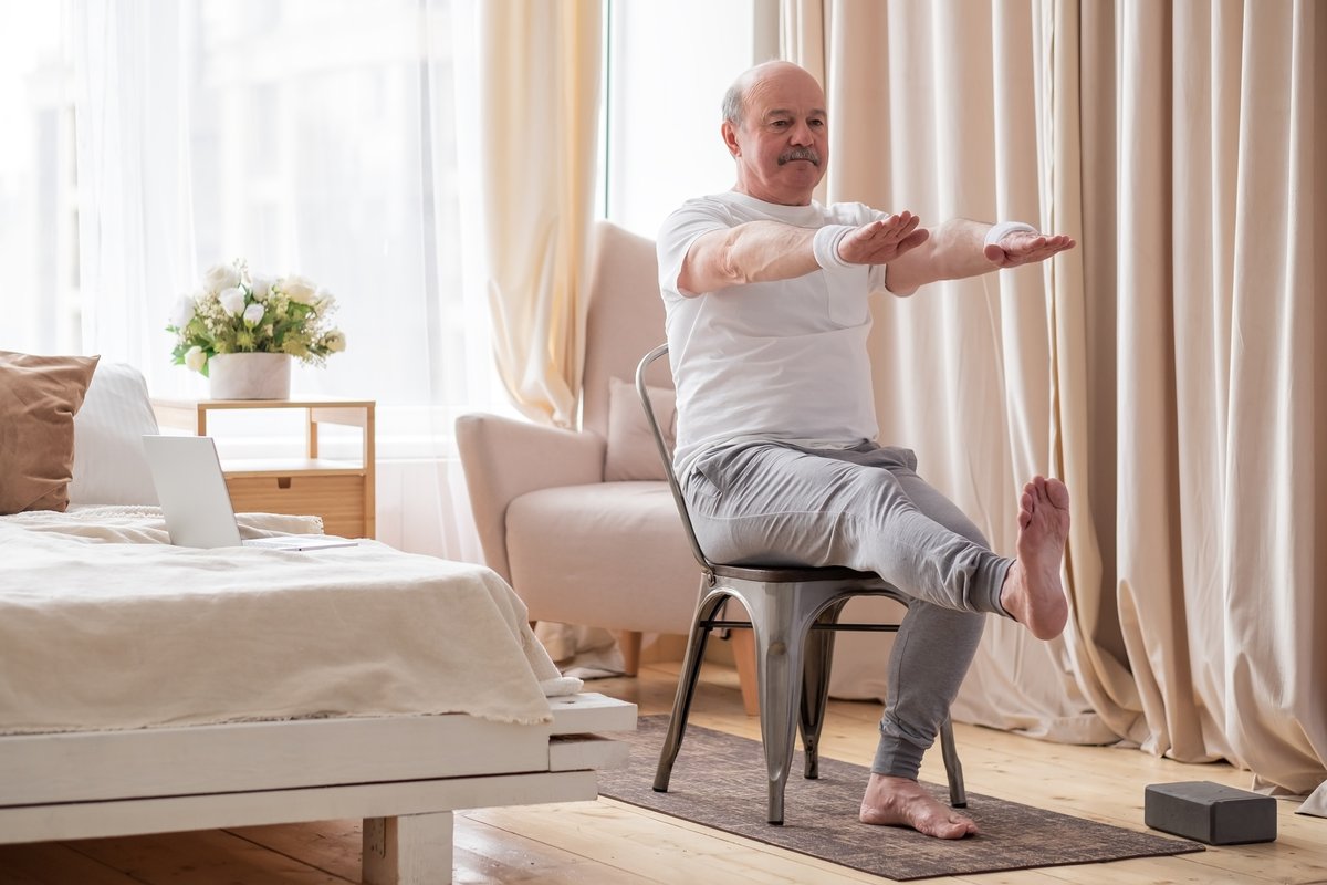 WADeptHealth's tweet photo. Watch the game AND prevent falls: Build strength with the senior chair exercise program. Be safe and independent in your home in the new year. Learn more: https://t.co/yfhzrZcQhA #FindingOurBalance #FallPreventionAwareness https://t.co/vfovXjlBeq