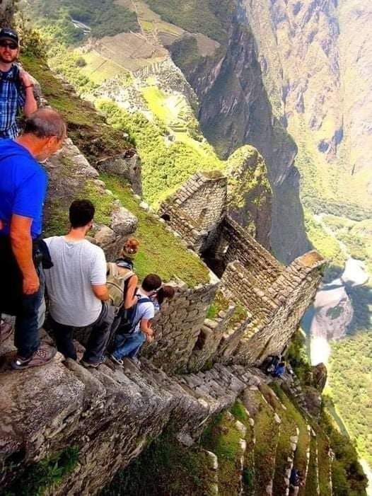 The 'Stair of Death' in Peru, built by the Inca civilization 600 years ago, to climb to the top of Mount 'Huayna Picchu' with a height of more than 8,850 feet, in order to build temples and terraces. #archaeohistories