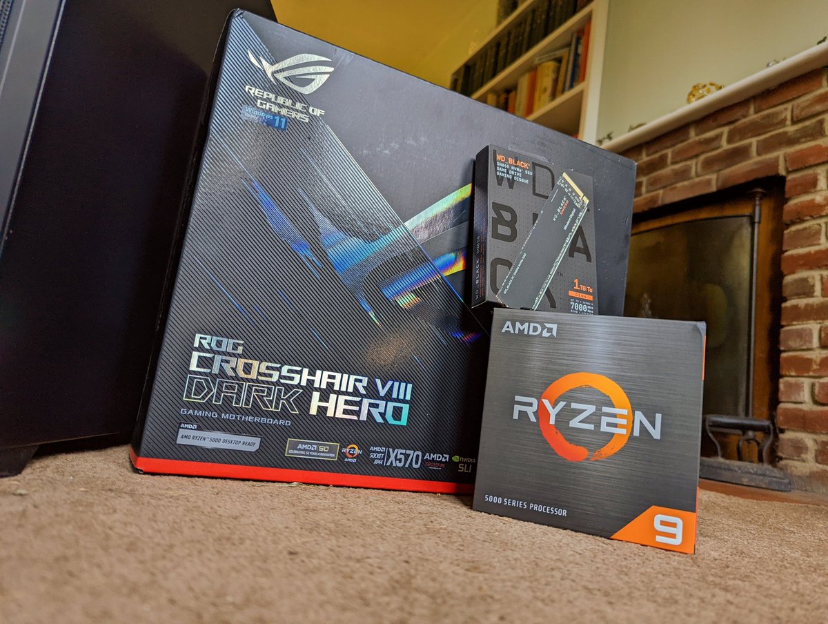 LiveActionPixel's tweet photo. Looks like we're Team Red now! 
Got the last few bits through from @OverclockersUK including the @AMD_UK 5950x which I can't wait to see how much of a beast it is  &amp; a lovely @wd_black 1tb to go with it. https://t.co/jswwe9qMOJ