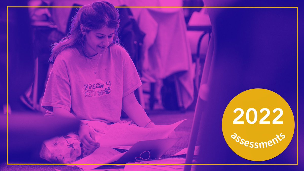 A student studies while sat on the floor in the West Building. 
