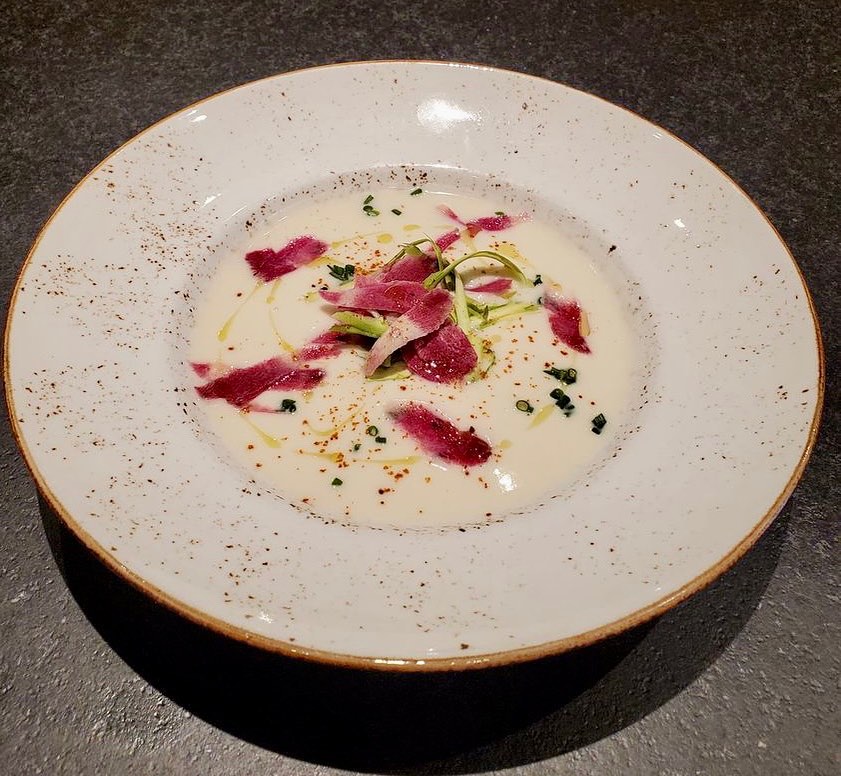 Our (vegan) Cauliflower Soup garnished with watermelon radish, asparagus, EVOO and espelette is perfect for this cold weather! Come try it tonight at San Lorenzo! 💛 #soup #sanlorenzodc #dc #italian #buono #italianfood #dcdining #dcfood #dctakeout #shawdc #dineinshaw #eatlocal