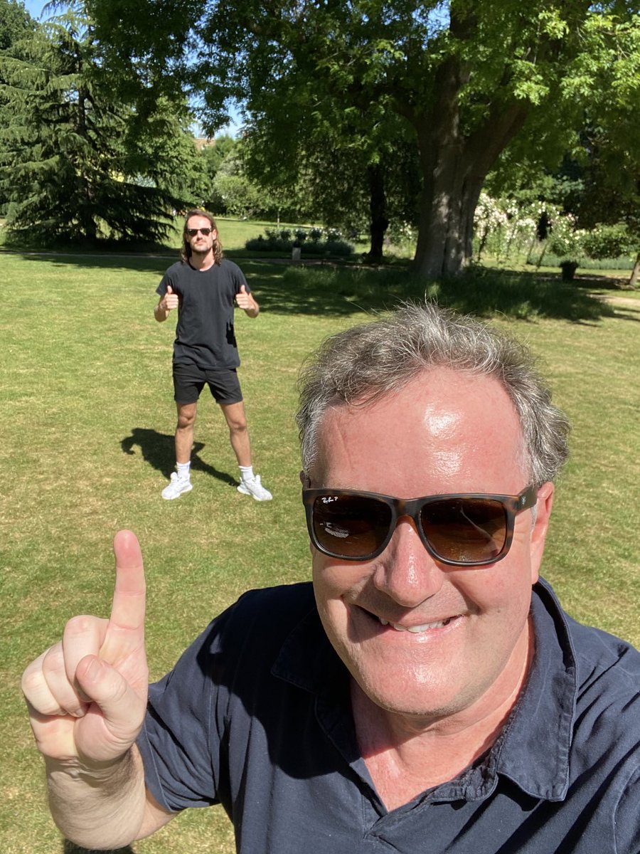 piersmorgan's tweet photo. On the day (May20, 2020) that ⁦@BorisJohnson⁩ attended his No10 party where 100 people were invited to ‘bring a bottle’, I met my eldest son for first time in 2 months, &amp; we stayed this far apart, without anyone else there, because that was BORIS JOHNSON’S BLOODY RULE. https://t.co/xglvj06oeg