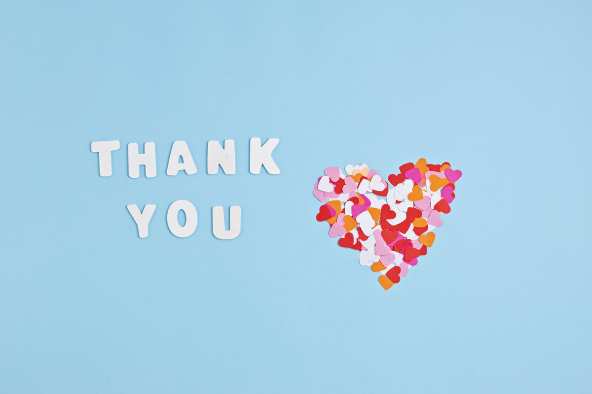 Das Bild zeigt ein Herz aus Papierschnipseln. Daneben steht "Thank You" geschrieben.