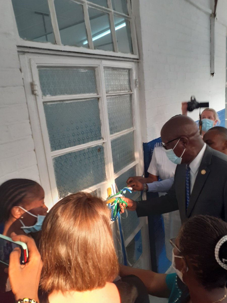 sislestudy's tweet photo. Dr.Deen giving a speech about the SISLE project at the formal opening of the ward refurbished for stroke patients today, and the honourable Minister for Health and Sanitation cutting the ribbon to open the ward with SISLE staff holding the ribbon on either side. #NIHR #stroke https://t.co/VckqdhnuRm