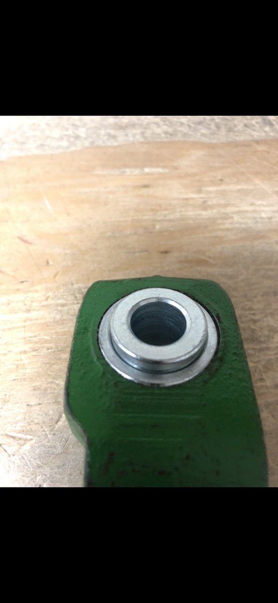 Down pressure arm repair. That is a new pin in the far side vs our bushings.