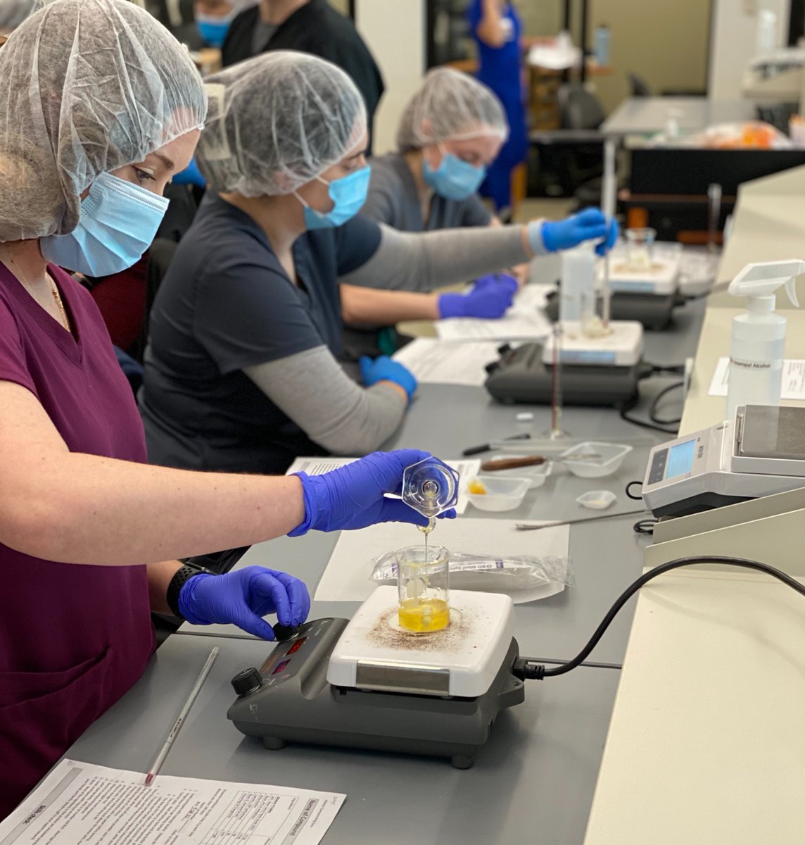 UNTHealth_Pharm's tweet photo. PharmD students in the Advanced Compounding elective are getting their first hands-on experience making lip balm and estrogen creams to learn the basics of making a quality compounded product. 💊
#HSCPharmacyExperience #PharmacyCompounding #PharmDtoBe #studentpharmacist https://t.co/cL9hwSHcRH