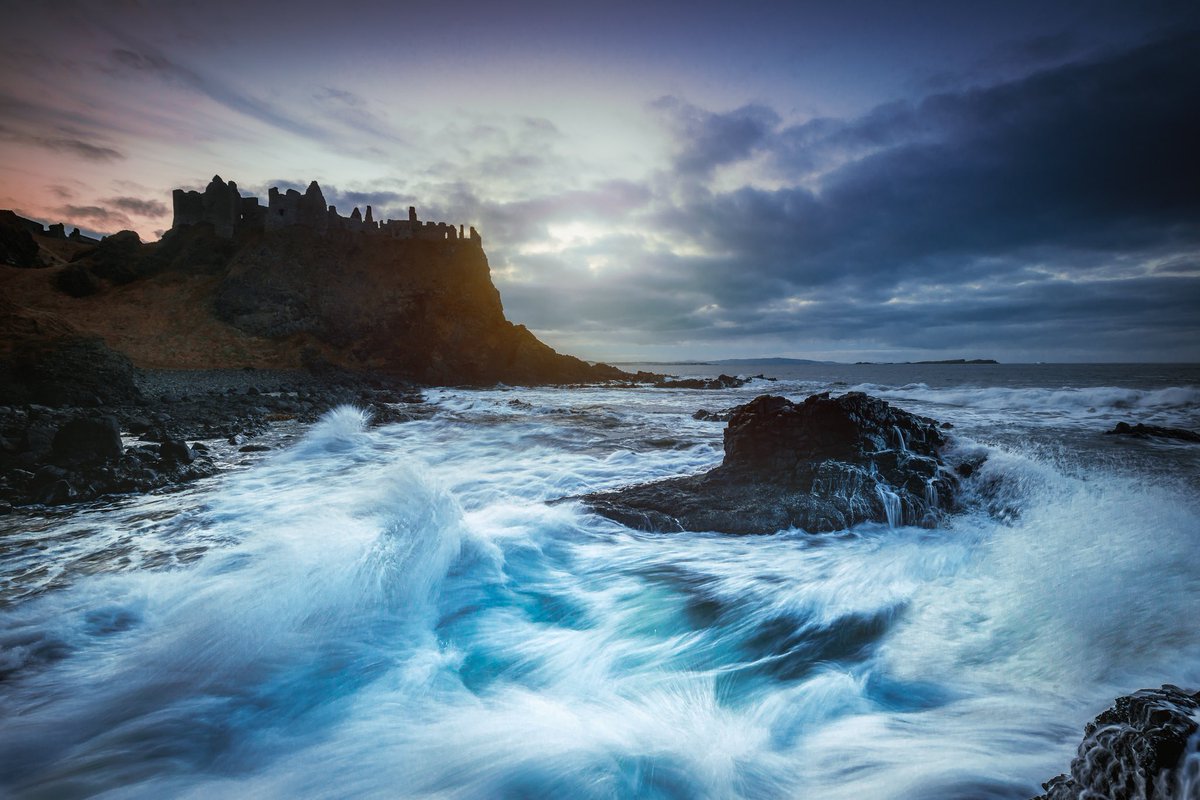 Siege by the sea The night and white horses attack the foundations of Dunluce Castle, a battle that has been roaring on for 500 long years. #discoverNI #causewaycoastalroute #ukshots