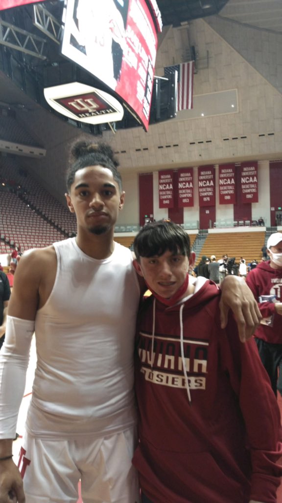 HoosierProject's tweet photo. Grant is attending his first IU basketball game with his dad Brad today thanks to an incredible donation! Even got to meet Khristian Lander during warmups. Enjoy the game guys! #iubb #HoosierTicketProject https://t.co/9KFTpVtvKT