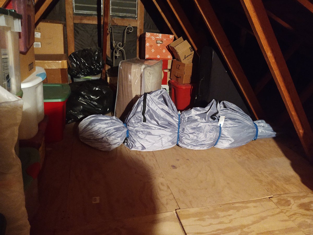 So we tried a new thing this year... I swear it's a plastic wrapped Christmas tree in a lawn furniture bag officer, honest, I swear!