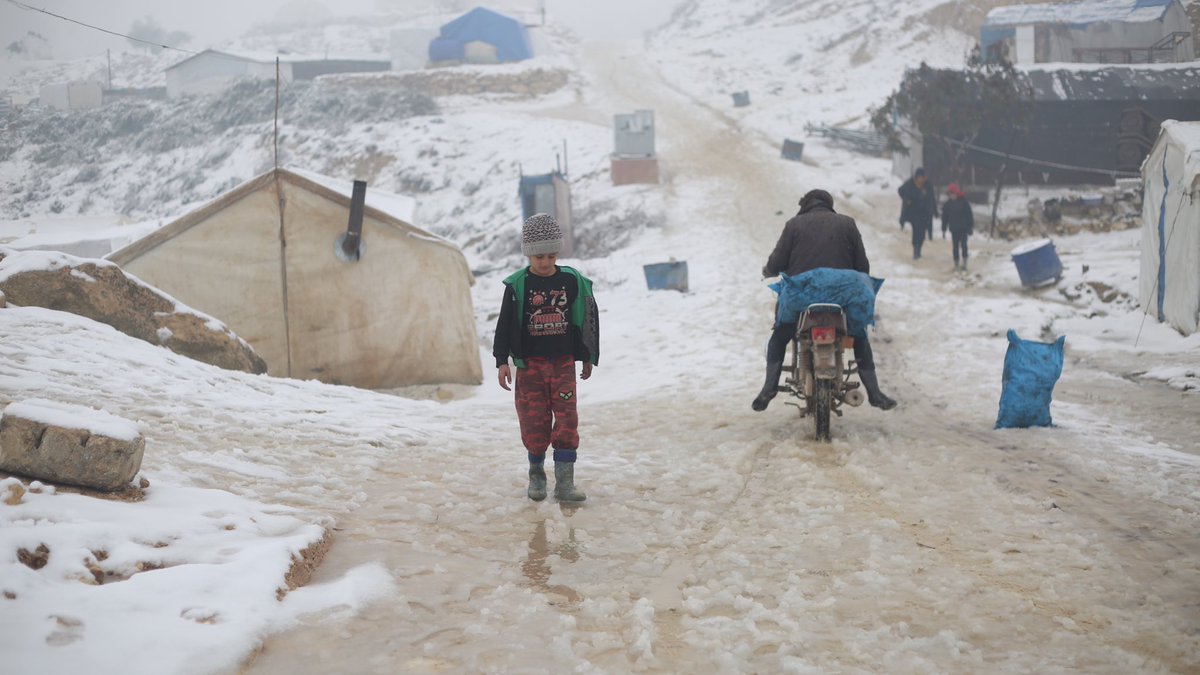 MarkCutts's tweet photo. #Syria: Snow, rain and cold weather continue to make life very difficult for displaced people in camps, like this one in Idlib. 

Meanwhile, humanitarian organizations are continuing to clear roads, repair or replace damaged shelters and provide emergency support https://t.co/h38PS2u7vF