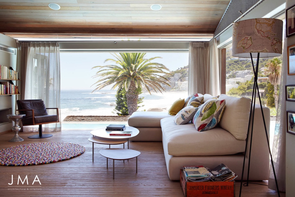 JMA_Architects's tweet photo. Nestled in the sensitive slopes of the Clifton Bungalow area, the Clifton Beach cottage interacts delicately with its surroundings. It forms part of the picturesque Clifton beach landscape and offers secluded beach living. https://t.co/tWEDtaFk1u