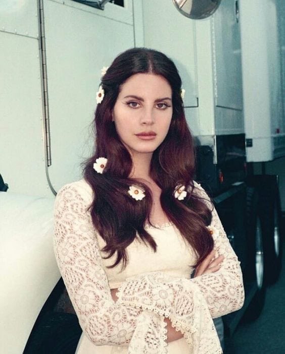 Pusha T shared a photo of Lana Del Rey with her face concealed by a mound of white residue.