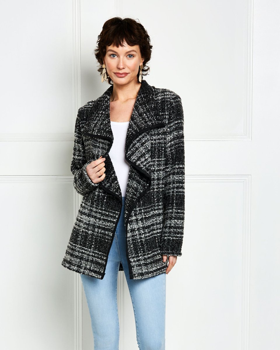 Throw on @mhwpatterns chic check coatigan whatever the weather with its pretty waterfall drape. To see how much fun this pattern is to sew, check it out inside issue 103 of Love Sewing! In shops now and online at bit.ly/3I3poOG