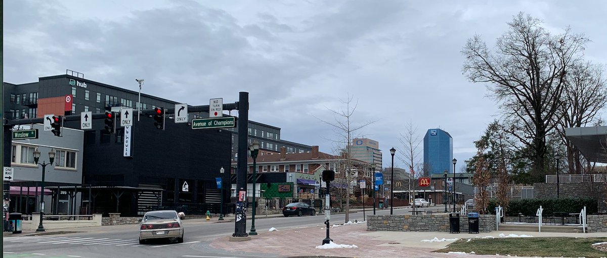 SamPolisky's tweet photo. A local here in Lexington might find this photo familiar with this active strip of restaurants, bars, and all being looked down upon by the incredible, 5/3rd Building. #lexcld260 https://t.co/b1TyWTtxw7