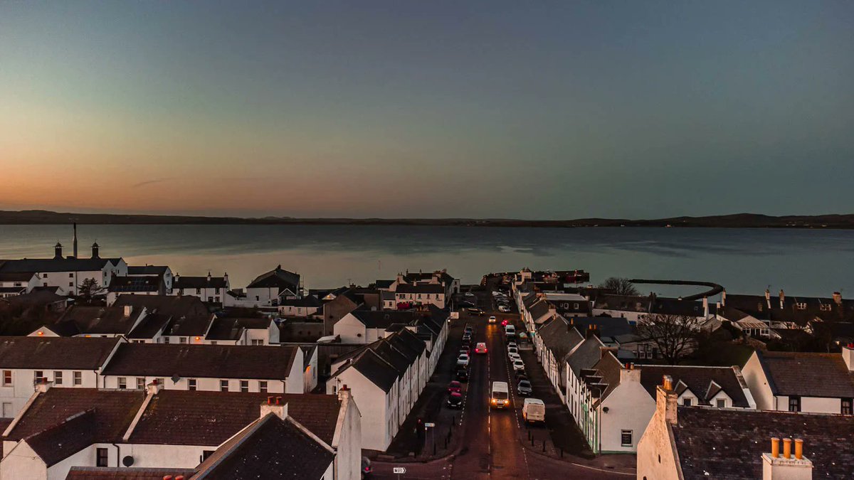 Looking down main street in Bowmore. 

 #visitscotland #Scottishcollective #lovescotland #isleofislay #simplyscotland #scotlandshots #nationaltrust #hiddenscotland #scotlandisnow #photomasteryclub #OutAndAboutScotland