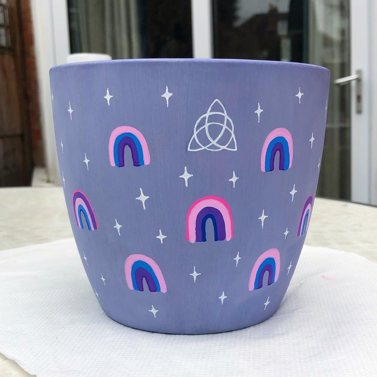 corvling's tweet photo. A plant pot I painted for @loafiebean a while back! 
It was my first time being able to draw in a long while, and my first time using traditional paint in even longer https://t.co/4yapOkrgtp