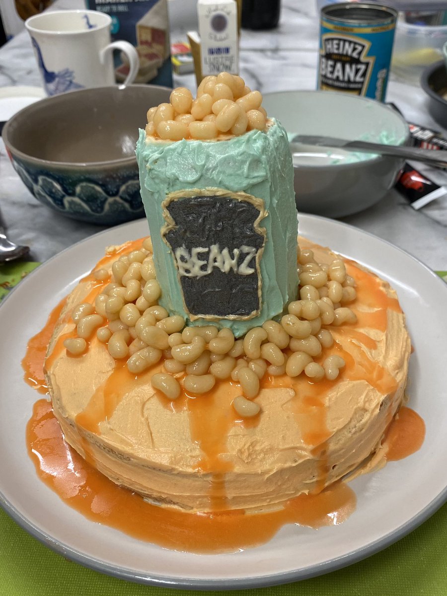 Holly_3412's tweet photo. My friend Grace loves beans so we made her this cake for her birthday @HeinzUK. The beans are marzipan and the bean juice is orange icing https://t.co/pbBxmjgLhp