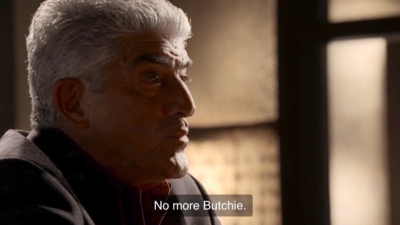 Phil Leotardo says "No more Butchie. No more of this." while sitting at his late brother's birthday party.