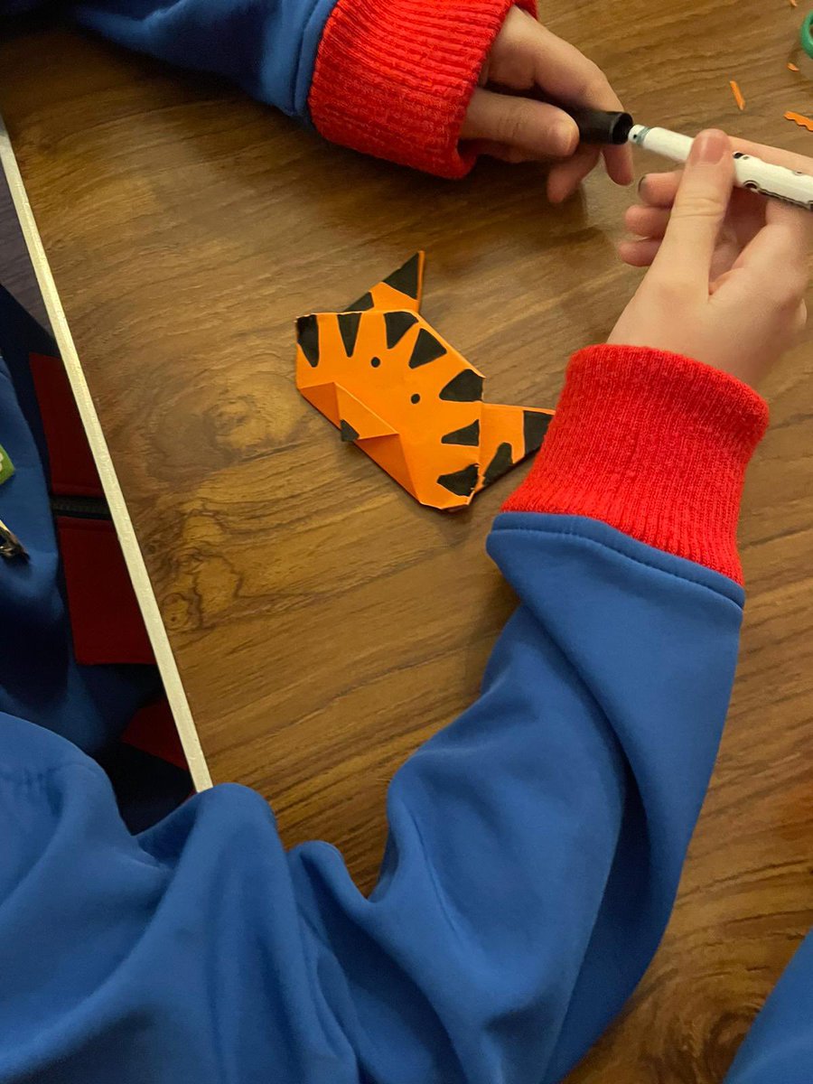 1stDidsbury's tweet photo. Tonight we celebrated the Lunar New Year (a little early!) with lots of tiger related activities 🐯 

One of our younger Guides, Imogen, shared her passion with us &amp; led a fabulous session where we created origami tigers. She’s a born leader! 

@Girlguiding_NWE @Girlguiding https://t.co/IUimaadRYS