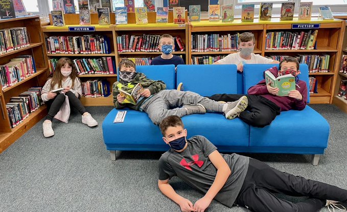 Mrs. Lynch's 5th graders visited the library to "stop, drop and read."
