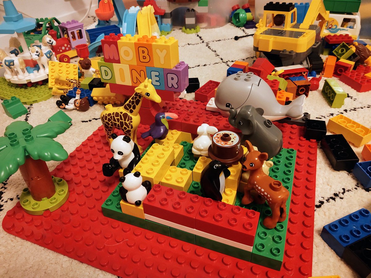 FelVdS's tweet photo. We have been reading Chu's day by @neilhimself and @MrAdamRex to our three-years-old at bedtime. Today, as we explore our creativity during quarantine, he asked to build Moby's Diner out of LEGO. This seems to be his favorite part of the book. #Quarantine https://t.co/WZyOi0XpmU