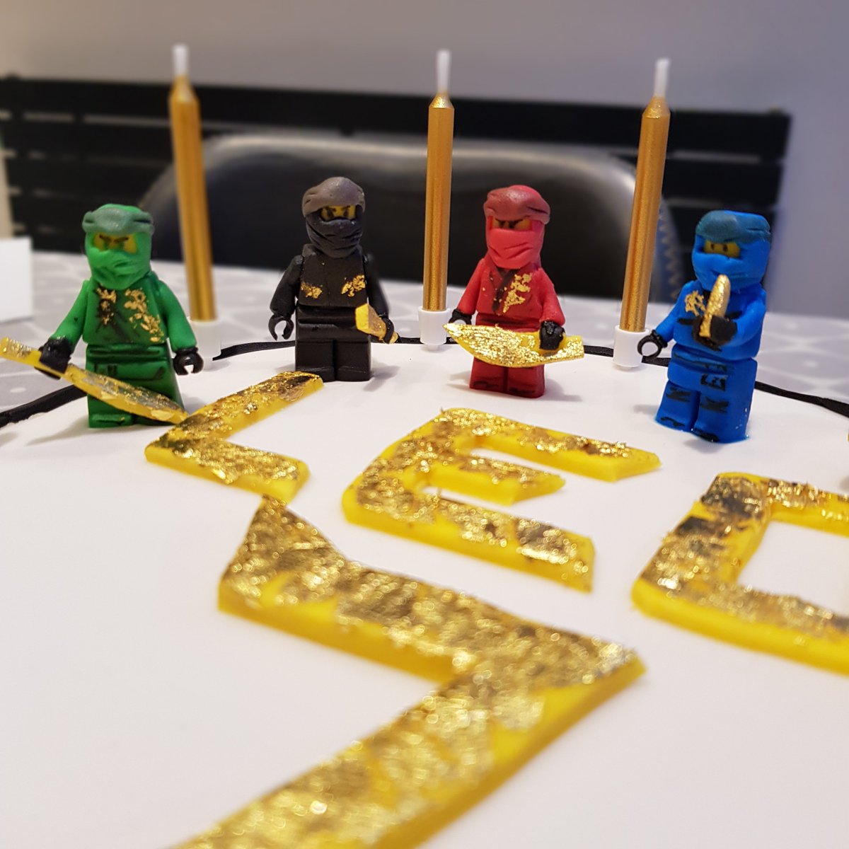 davidlloydmost1's tweet photo. @LEGO_Group #ninjago figures made from fondant icing, this was a very fiddly birthday cake to construct! Leo enjoyed eating Master Wu first. https://t.co/5zI8CYlnO1