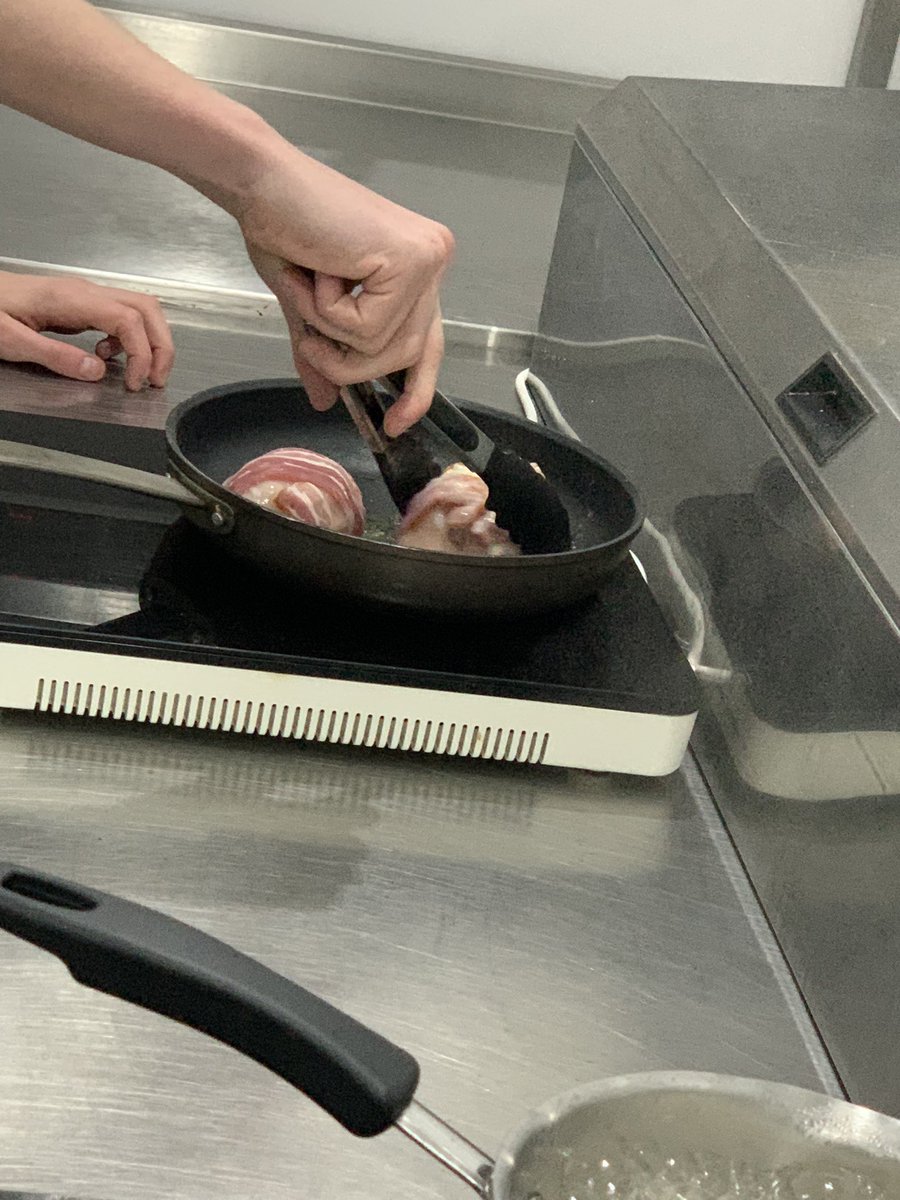 WestsChefsAcad's tweet photo. Chicken Balmoral is on the way! Shaun is hard at work with chef @laulaulovescake guiding him through the process. We can’t wait to see the finished plate 🍽👀 @Hub_Internation https://t.co/qp409TrJZg