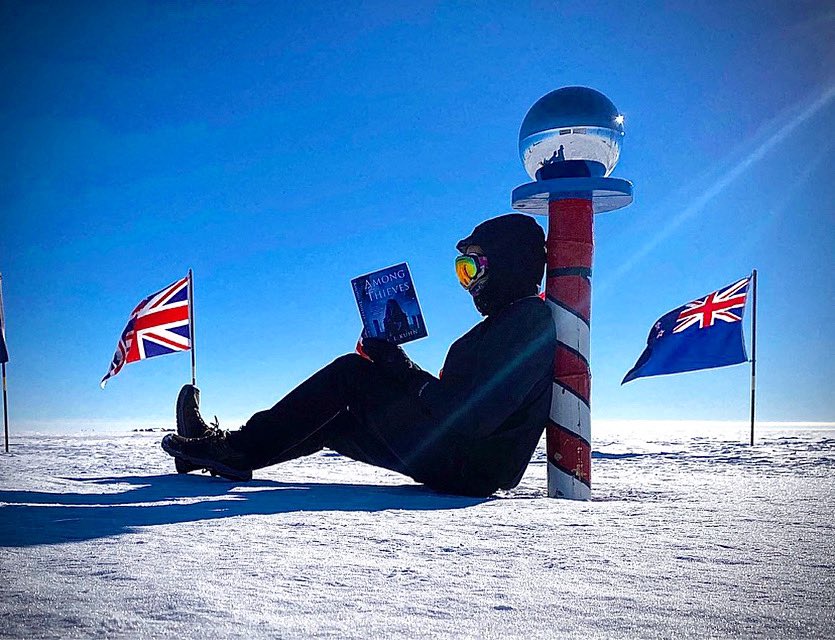 This is without a doubt the coolest place AMONG THIEVES has been 🤩 

Pictured: a scientific researcher at the South Pole Station reading AMONG THIEVES at the literal South Pole of this planet 🤩😮

<a href="/sagasff/">SAGAS FF</a> <a href="/gollancz/">Gollancz</a> 

Photo credit: Brandon Amat