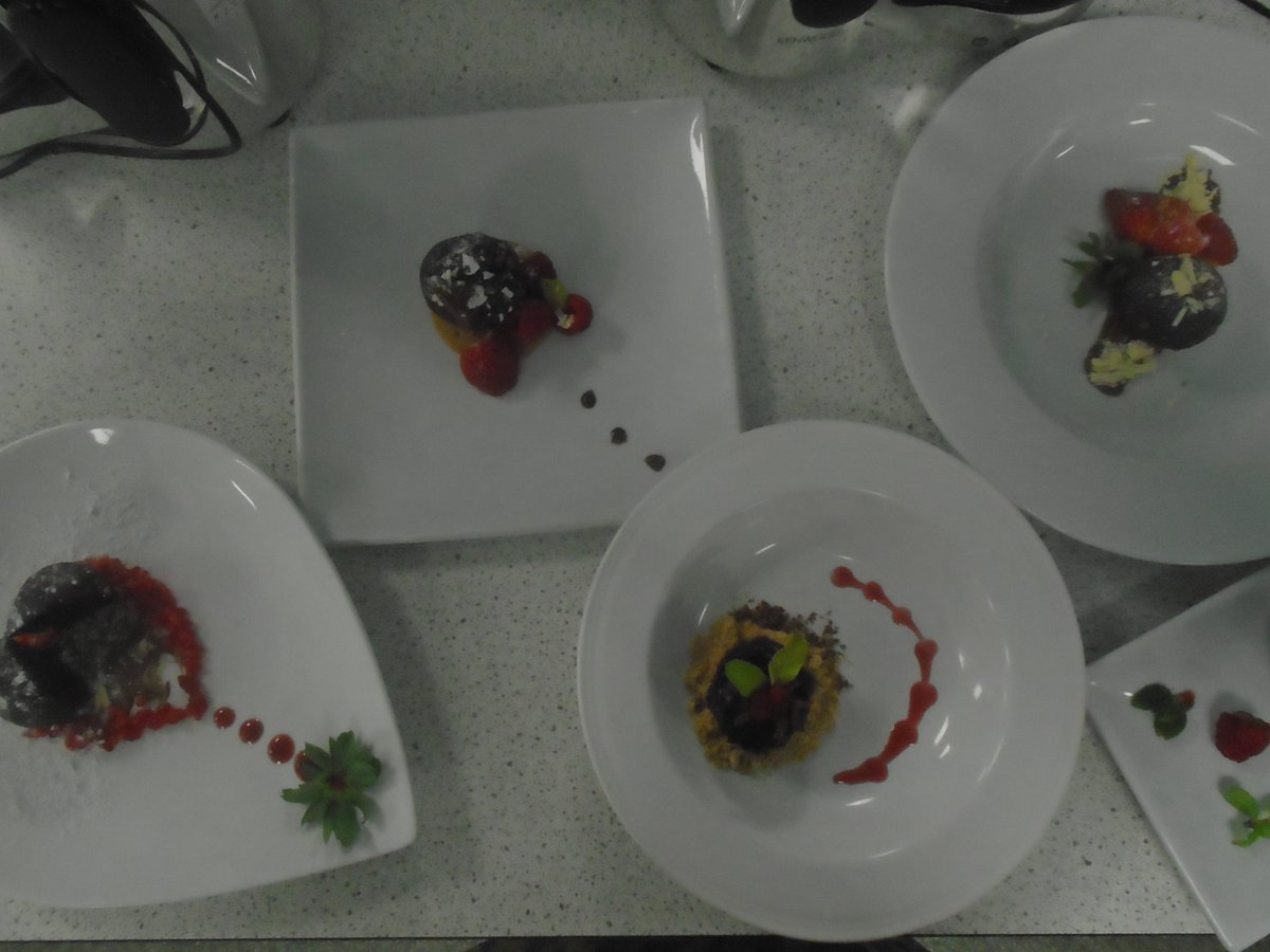 Year 11 have been working on how to present food in preparation for their practical exam.  Each student was given a small chocolate cake and a digestive biscuit and set the challenge to present beautifully.  Proud of our creative students.