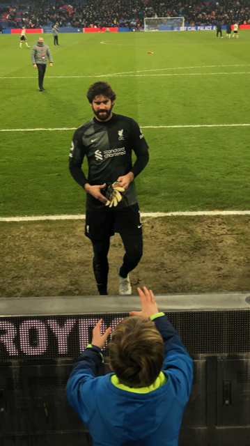 x_basement's tweet photo. Thank you @Alissonbecker. This is the moment when the greatest goalkeeper in the world ran the length of Selhurst Park to give his gloves to a young fan. Many magic moments since following @LFC in 1974 but very hard to beat this. #YNWA https://t.co/BeJNJ0rQuj