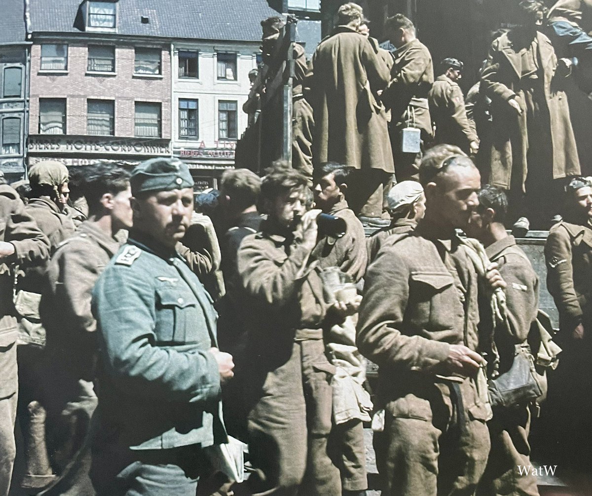 TheWorldatWar2's tweet photo. British soldiers are rounded up to be taken in to captivity after being taken prisoner at Dunkirk - May 1940 #ww2 #worldwar2 #dunkirk #dunkirque #may1940 https://t.co/LxV746m62l